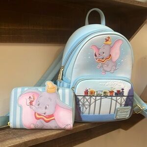 Used once Dumbo Loungefly Backpack and wallet.